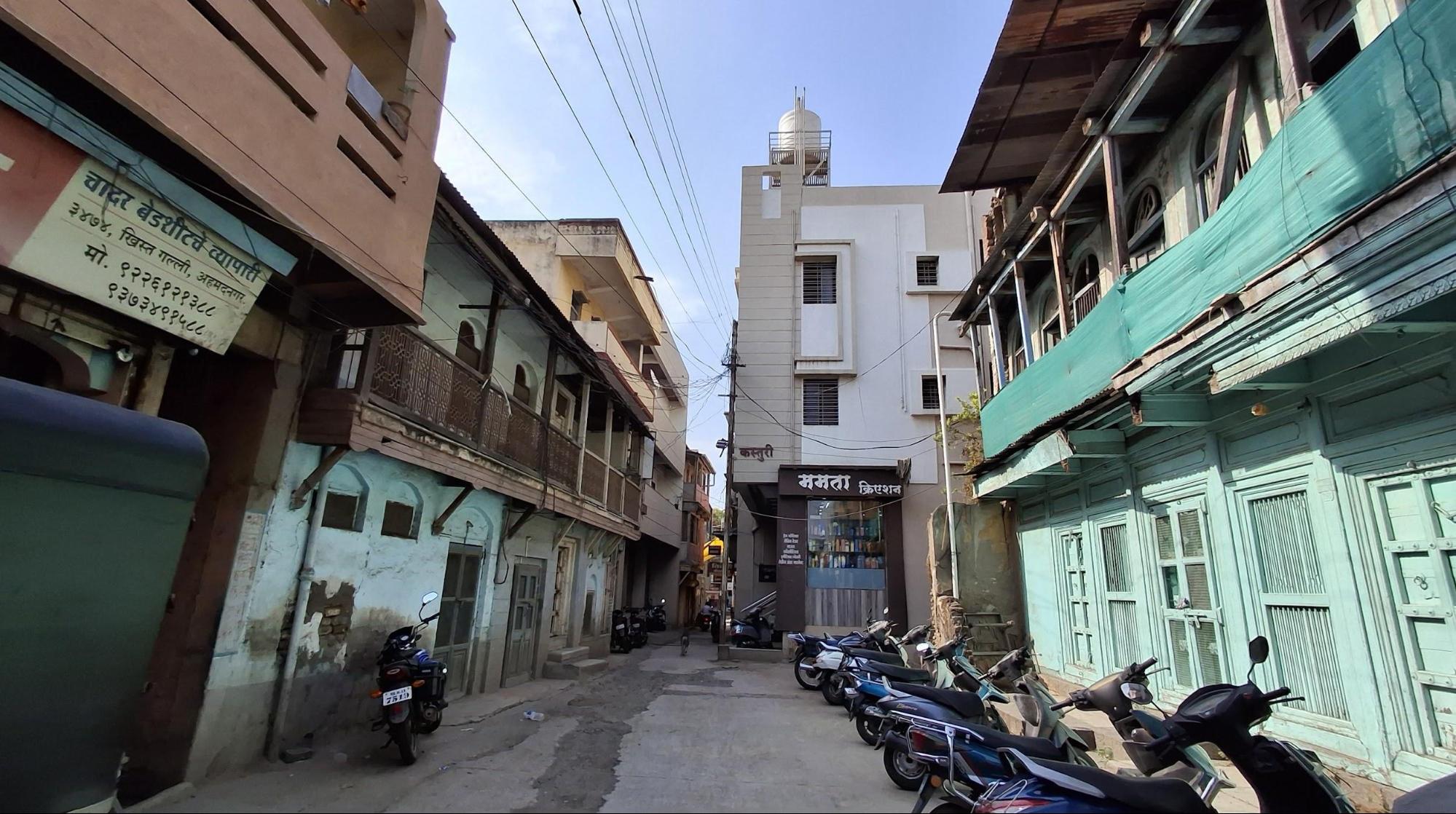 A view of both residential structures and the narrow road that passes in the middle. (Source: CKA Archives)