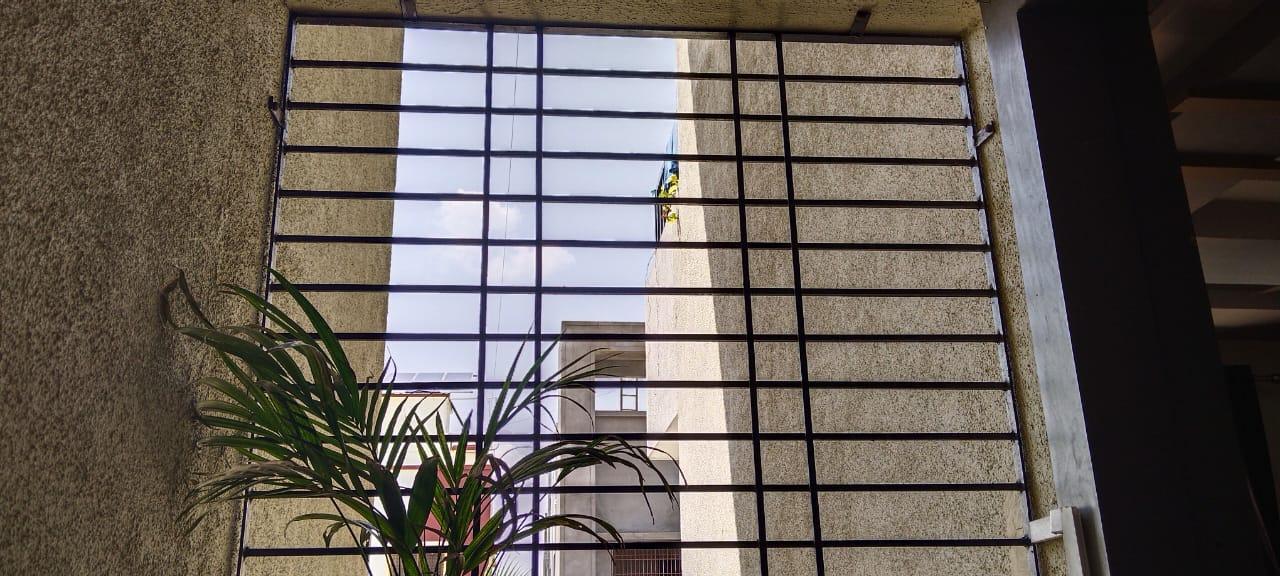 The windows are fitted with mild steel grills featuring what is called a ‘Bombay design.’ (Source: CKA Archives)