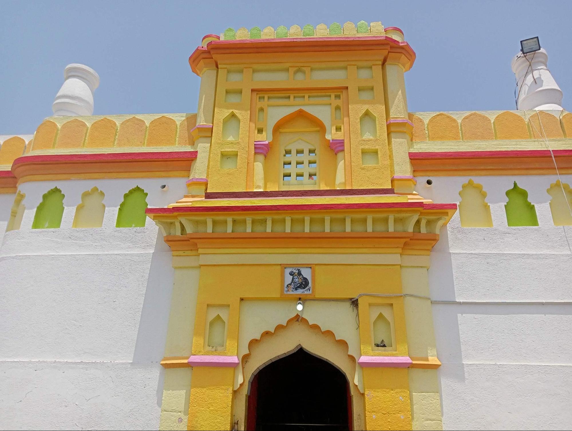 Moreshwar Mandir in Barshi Takli, highlighted in vibrant yellow, green, red, orange, and pink colors, blending Hemadpanthi form with a masjid-like exterior. (Source: CKA Archives)
