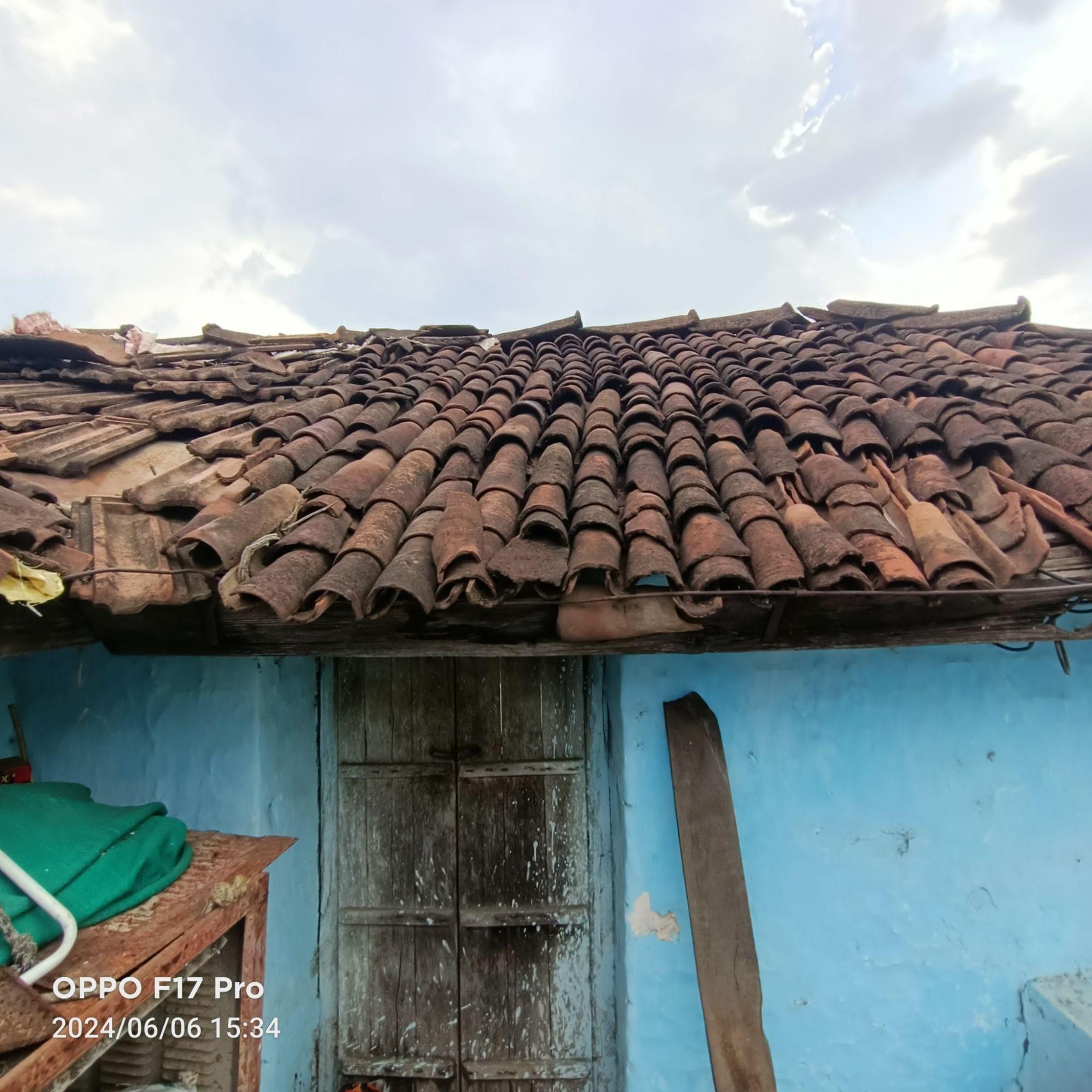 Close-up view of the layered arrangement of Mangalore tiles forming the clay tile roof. (Source: CKA Archives)