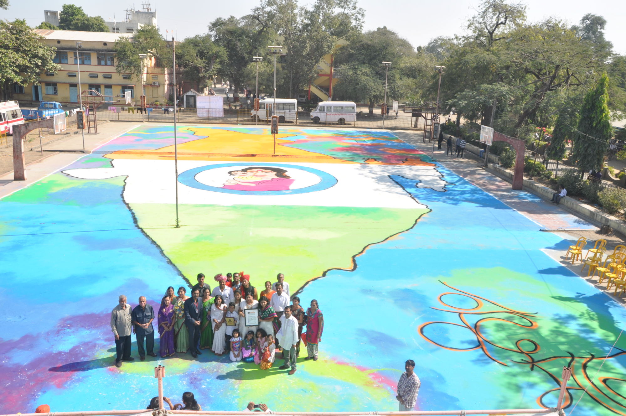 Rangoli installation at Jog Stadium, Amravati, a 1,500+ foot-long rangoli created to promote social messages such as “Save the Girl Child” and “Protect Nature.”[1]