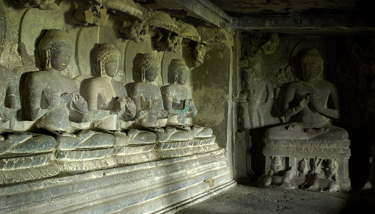 Ellora’s Buddhist caves follow the Mahayana rock-cut architectural style, with sculpted Buddha images lining the walls of multi-storeyed viharas.[4]