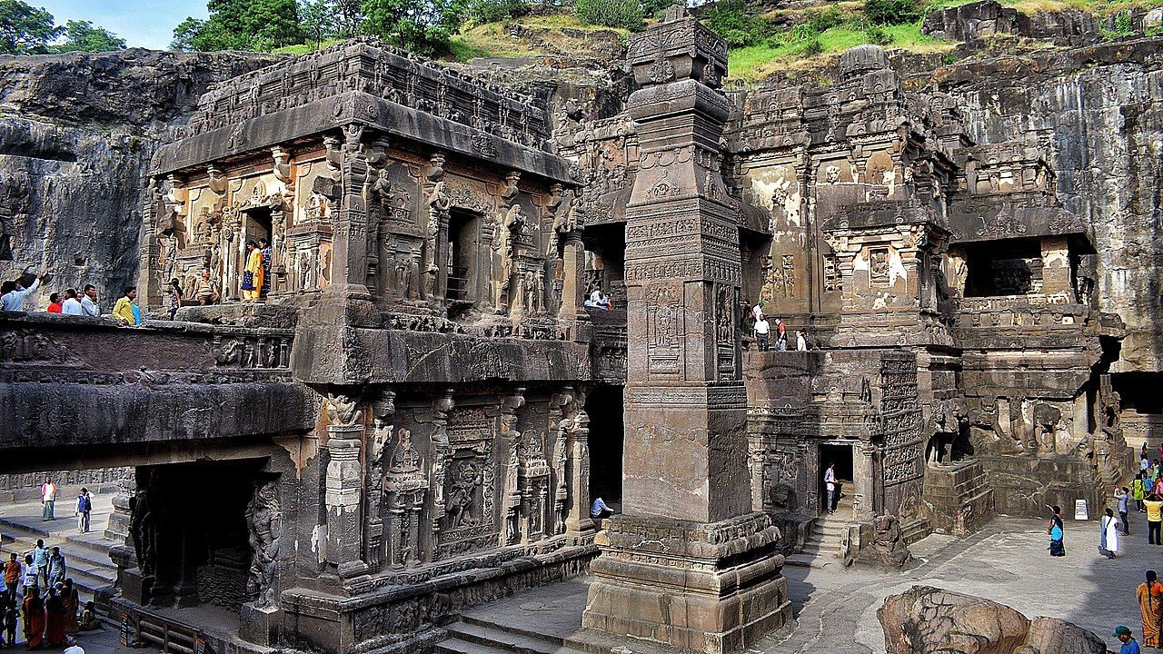 The Ellora Caves, near Verul village, are a unique complex of rock-cut caves representing Buddhist, Hindu, and Jain traditions.