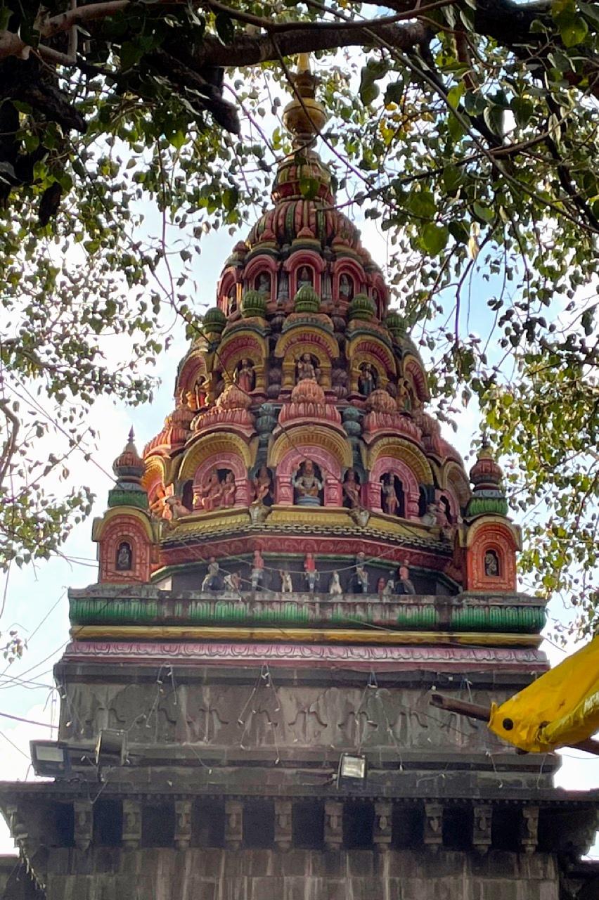 The shikhara (spire) of Tulja Bhavani Mandir rising above the surrounding landscape. (Source: CKA Archives)