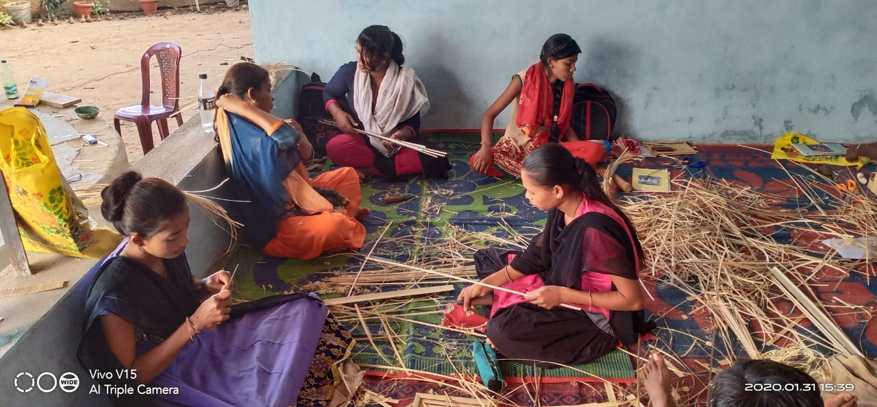 Participants at the training center engaged in craftwork within the former tehsildar’s office in Bhamragad, Gadchiroli.[2]
