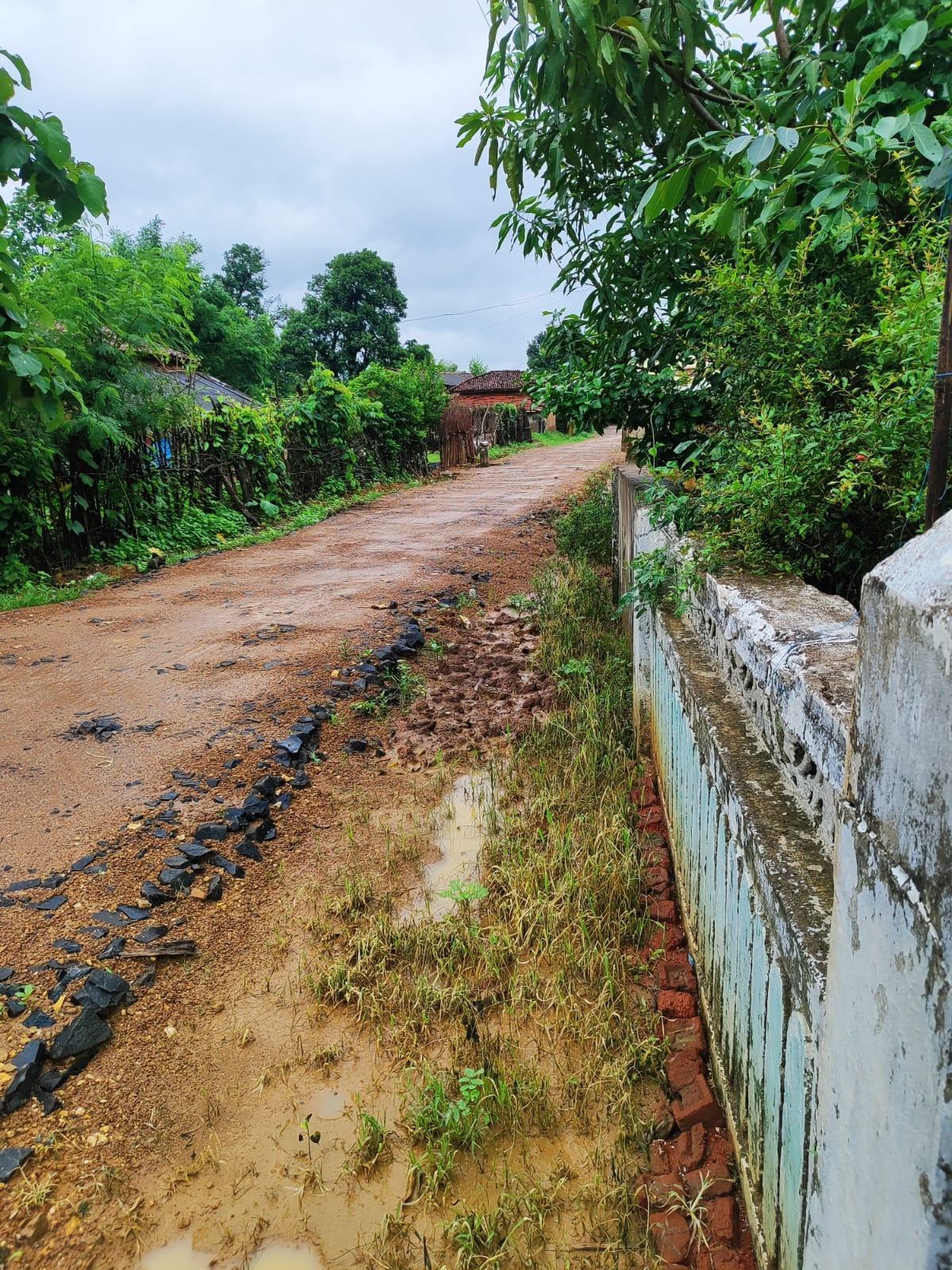 Mud road that leads to the house. (Source: CKA Archives)