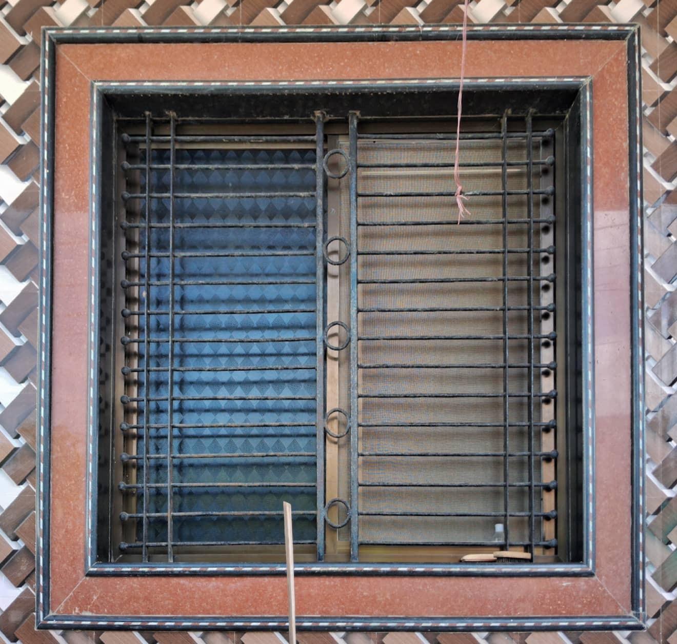 Notice how the border of the window is the same as the border around the main door. (Source: CKA Archives)