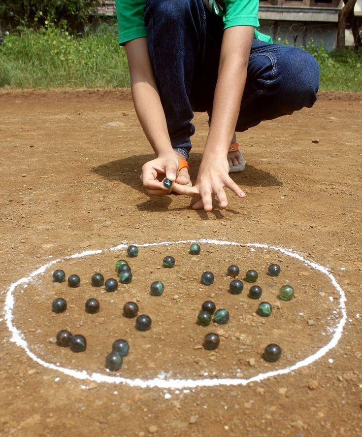 Kancha or Gotya, is a traditional Indian game that children still enjoy today.(Source: CKA Archives).