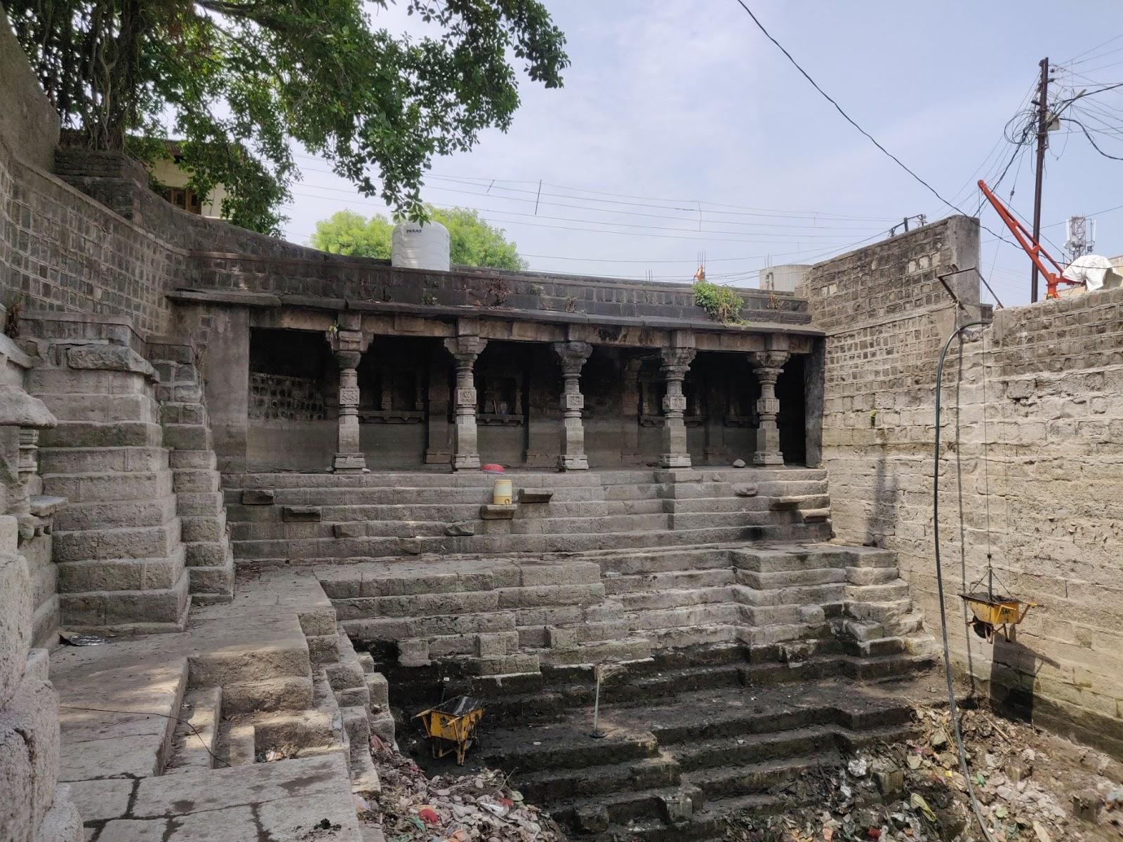 Interior view of Kavandi Stepwell, with staircases narrowing into a kund-like form. (Source: CKA Archives)