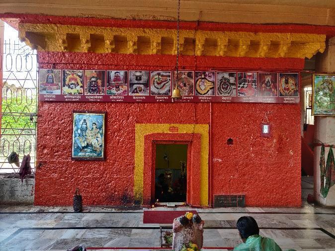 The entrance to the Shiv Mandir, marked by a vibrant red color, leads into a centuries-old structure built in the Hemadpanthi style. (Source: CKA Archives)