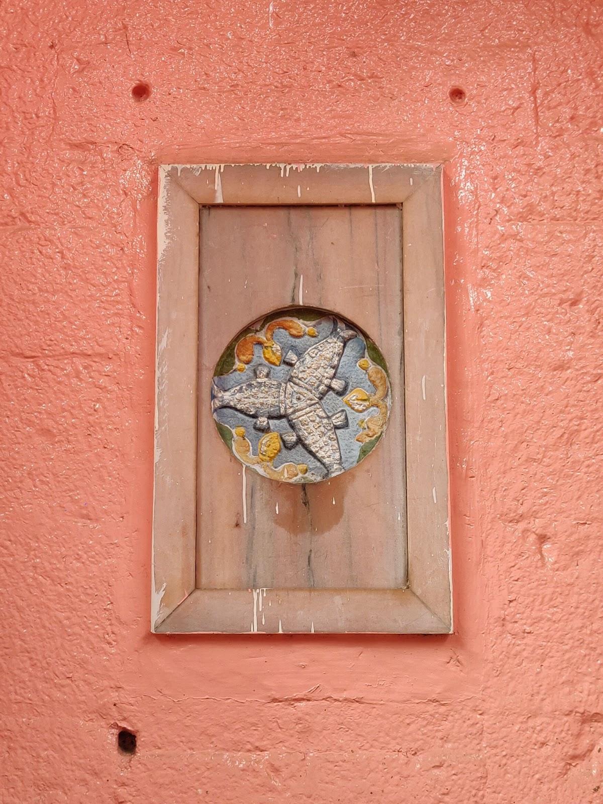 Fish motif embedded in the mandir’s walls (Source: CKA Archives)