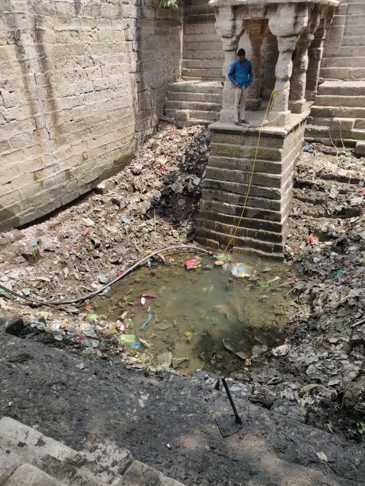 The Current state of the Stepwell is bad due to garbage being dumped in it. (Source: CKA Archives)