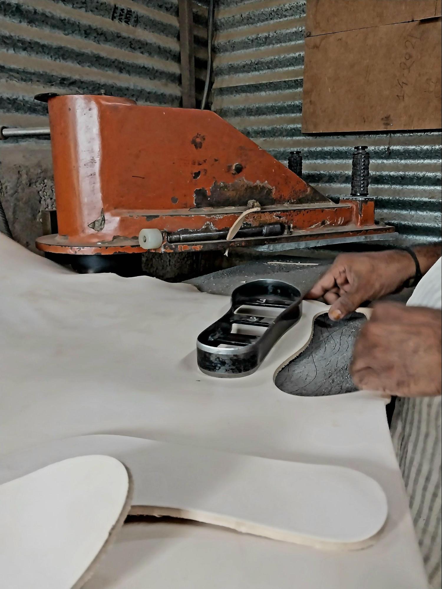 A stencil used to cut the leather for the sole. Source: CKA Archives