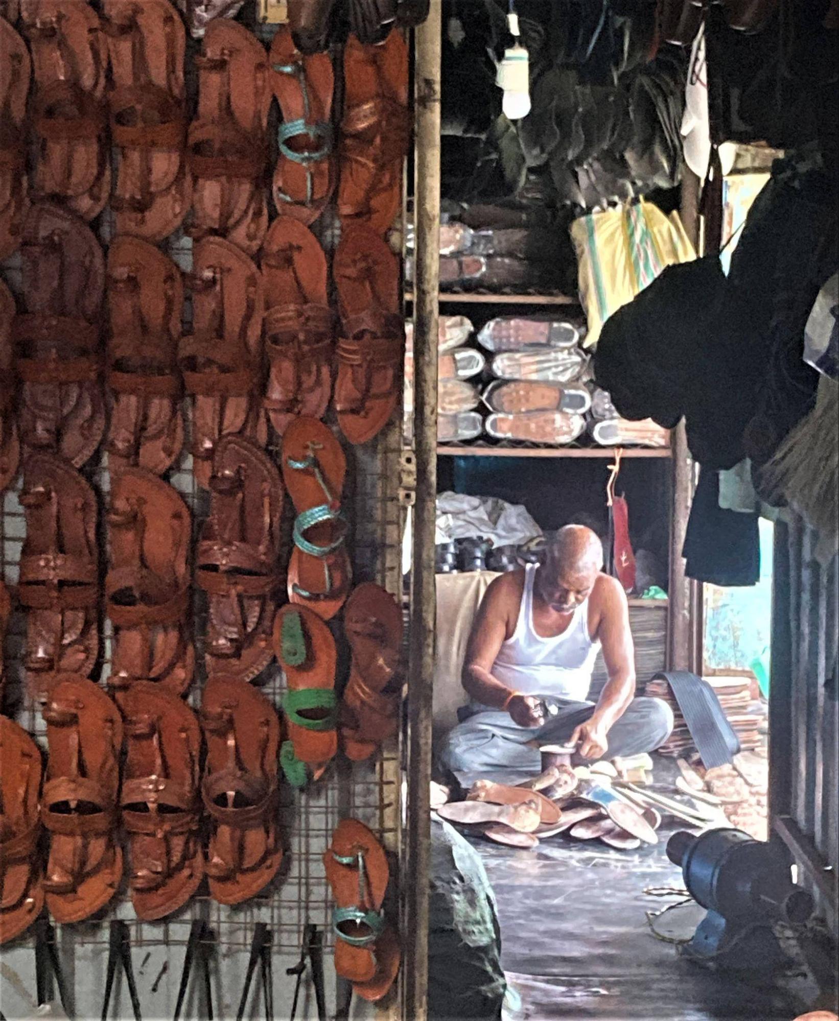 A shoemaker working on leather chappals in Latur. (Source: CKA Archives)