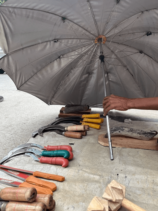 Finished sickles with wooden handles of various colors. (Source: CKA Archives)