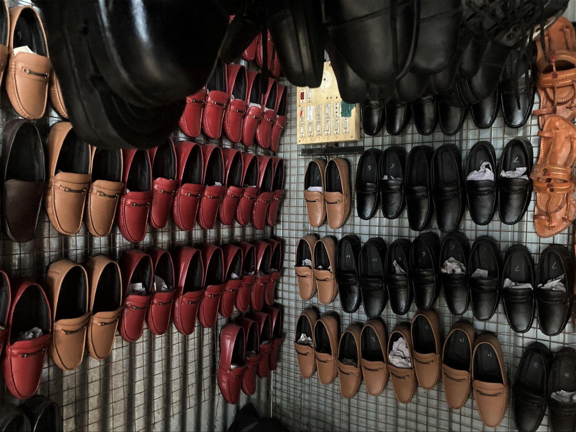 Leather shoes and traditional chappals displayed together. (Source: CKA Archives)