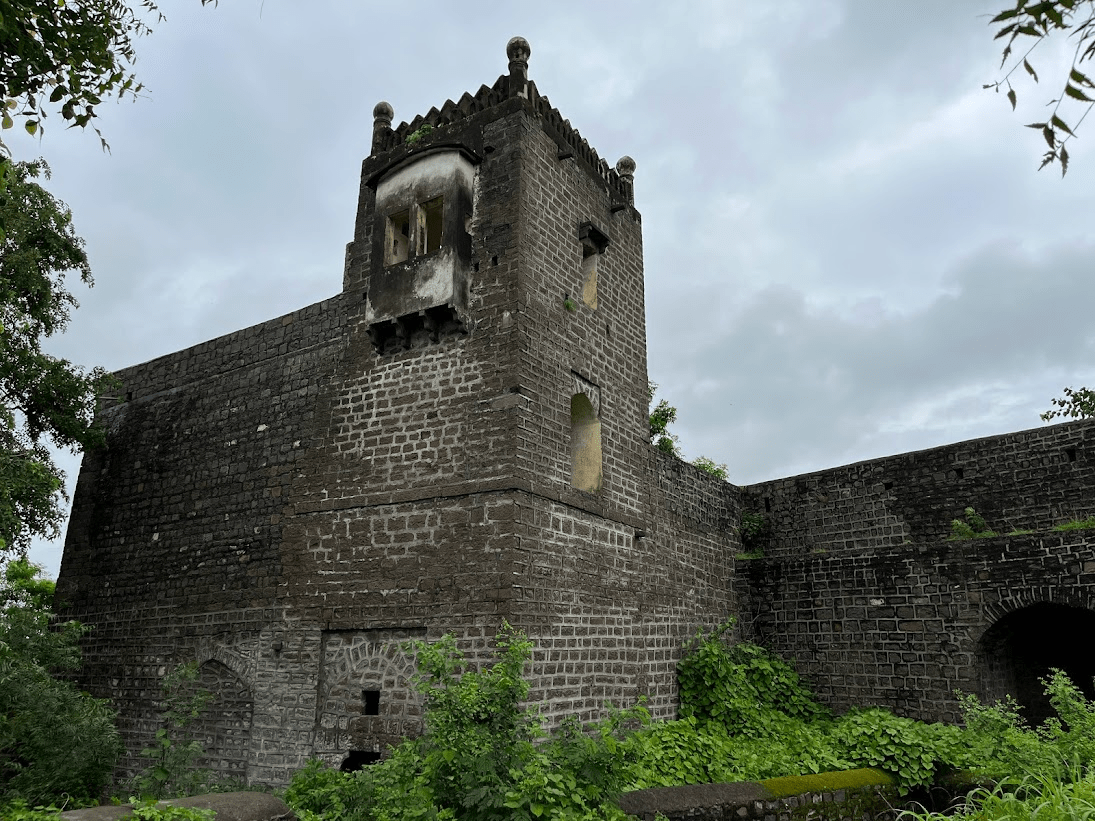 A small viewing window embedded in the outer wall of a structure that lies in the fort. (Source: CKA Archives)
