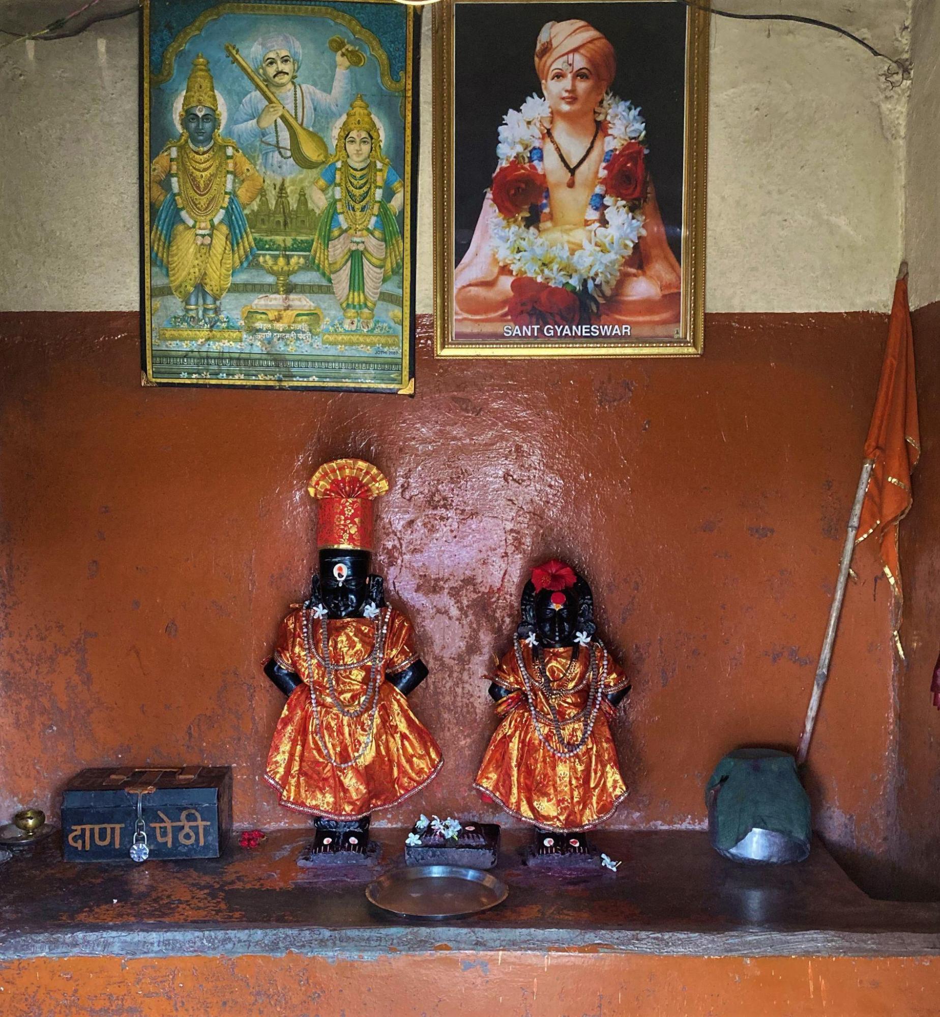 Devta Vitthal and Devi Rukmini placed inside the inner chamber of the mandir.A photo of Sant Dnyaneshwar is also kept within the mandir, showcasing its association with the Bhakti movement and the Varkari tradition in Maharashtra. (Source: CKA Archives)