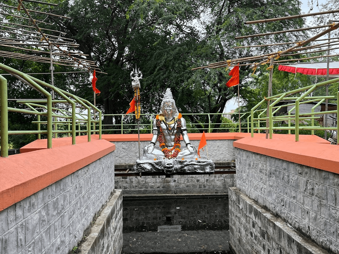 Outside the mandir, a silver-plated depiction of Bhagwan Shiv, beautifully adorned with garlands, stands as a symbol of reverence.(Source: CKA Archives)