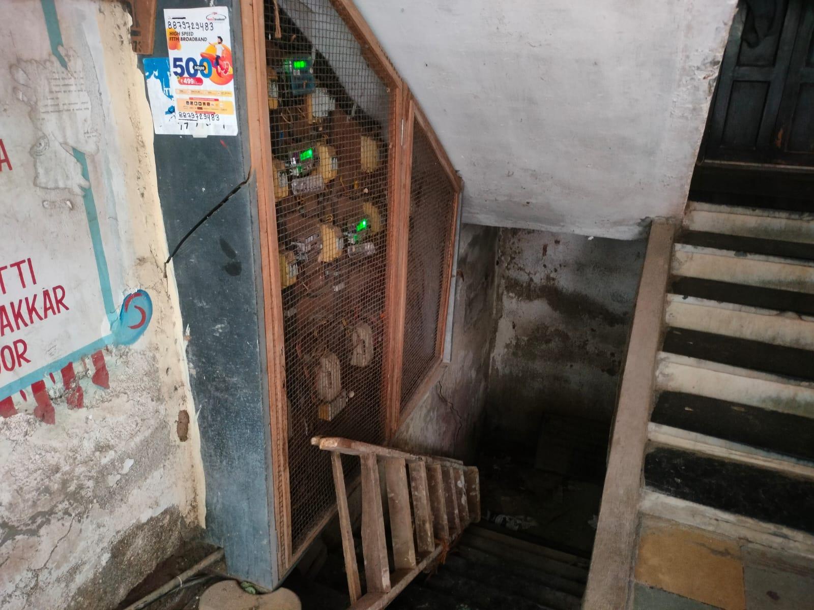 An incomplete staircase at the rear ends at a sealed, unused basement area. (Source: CKA Archives)