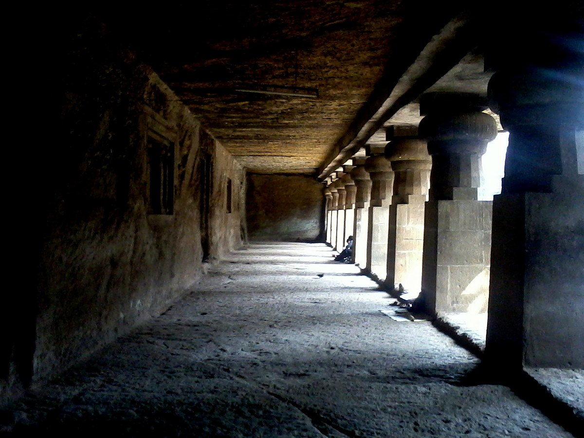 Central hall supported by 20 carved pillars, showcasing the structural planning of Jogeshwari Caves.[3]