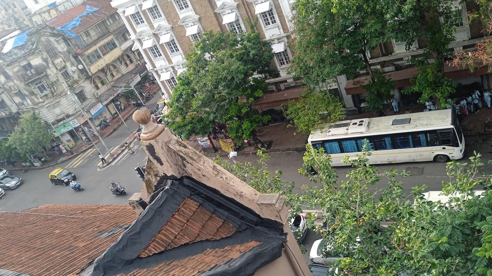 A sloping roof composed of mud-colored clay shingles. Source: CKA Archives