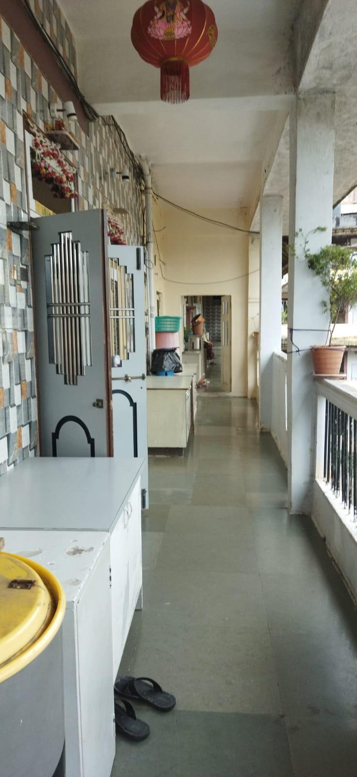 Internal lobby passage that connects all apartments and has a stone-tiled flooring. Source: CKA Archives