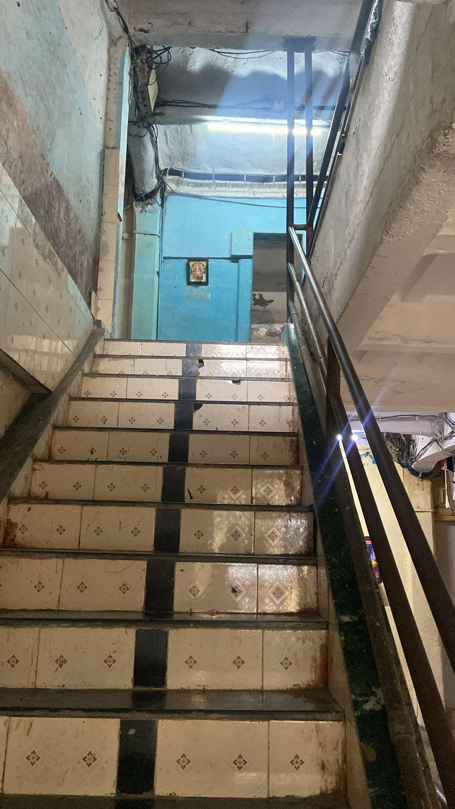 Tiled staircase paired with a minimalist, painted MS railing. Source: CKA Archives