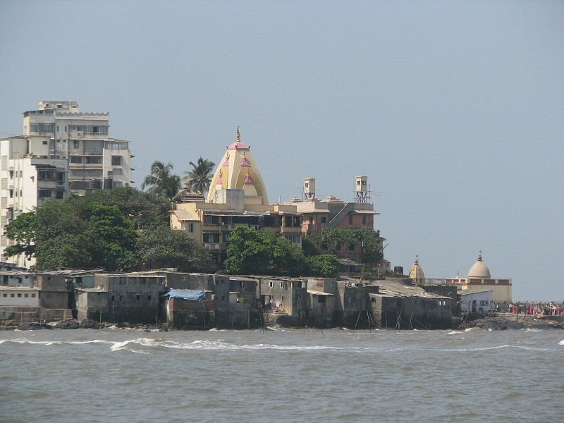 The Mahalakshmi Mandir on Bhulabhai Desai Road sits on the Worli seashore in Mumbai City[19]
