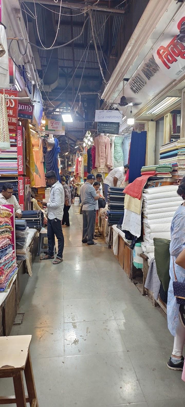 Shoppers walk through Mangaldas Market, Mumbai’s largest textile hub, known for its wide range of fabrics and wholesale prices(Source: CKA Archives).
