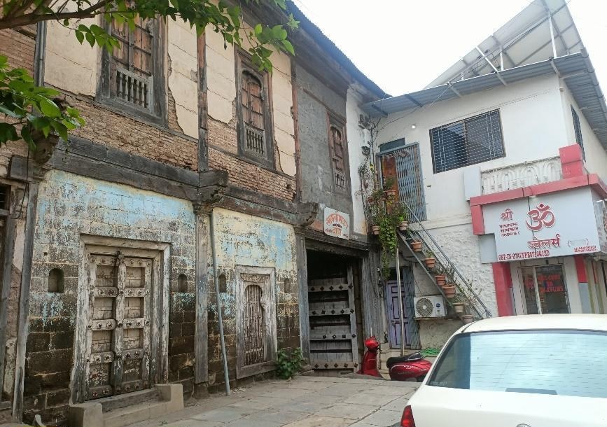 Notice the unique construction of the wada; the first floor is built with stone, while the second floor uses cement bricks. (Source: CKA Archives)