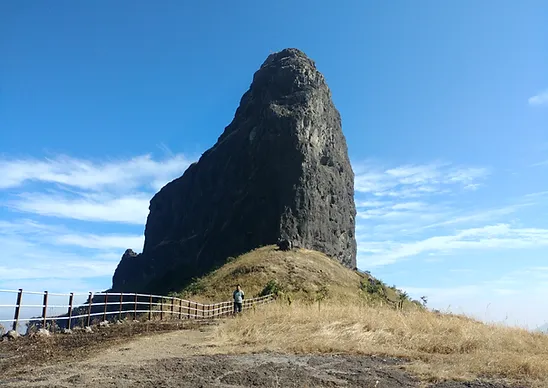 Dhodap Fort, located near Chandwad in Nashik district, features rock-cut chambers, twin gateways, and a summit mazar, all perched nearly 5,000 ft. high.