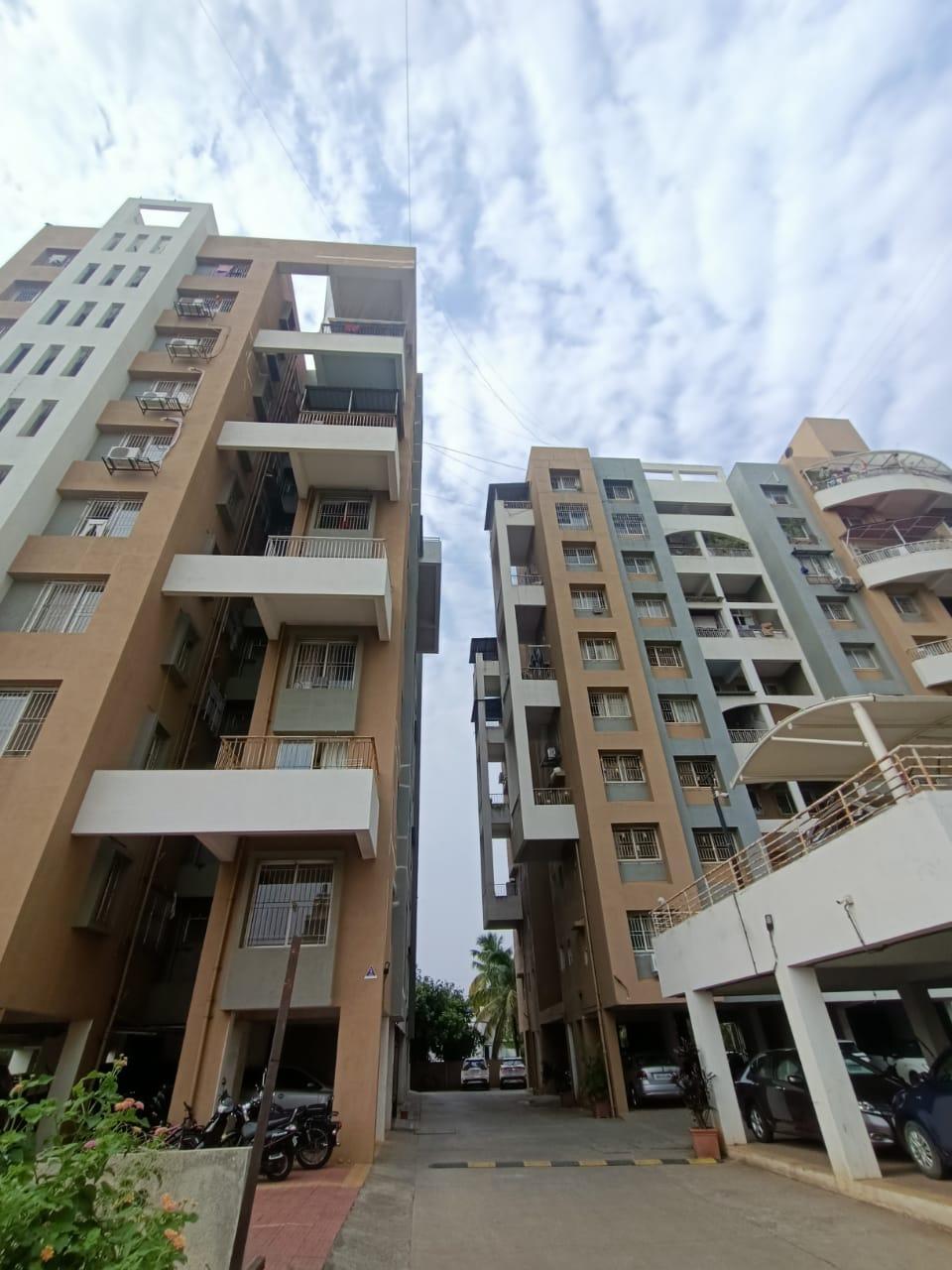 A closer view of the residential building which has a modular design featuring contrasting rectangular panels of cream, light brown and grey. (Source: CKA Archives)