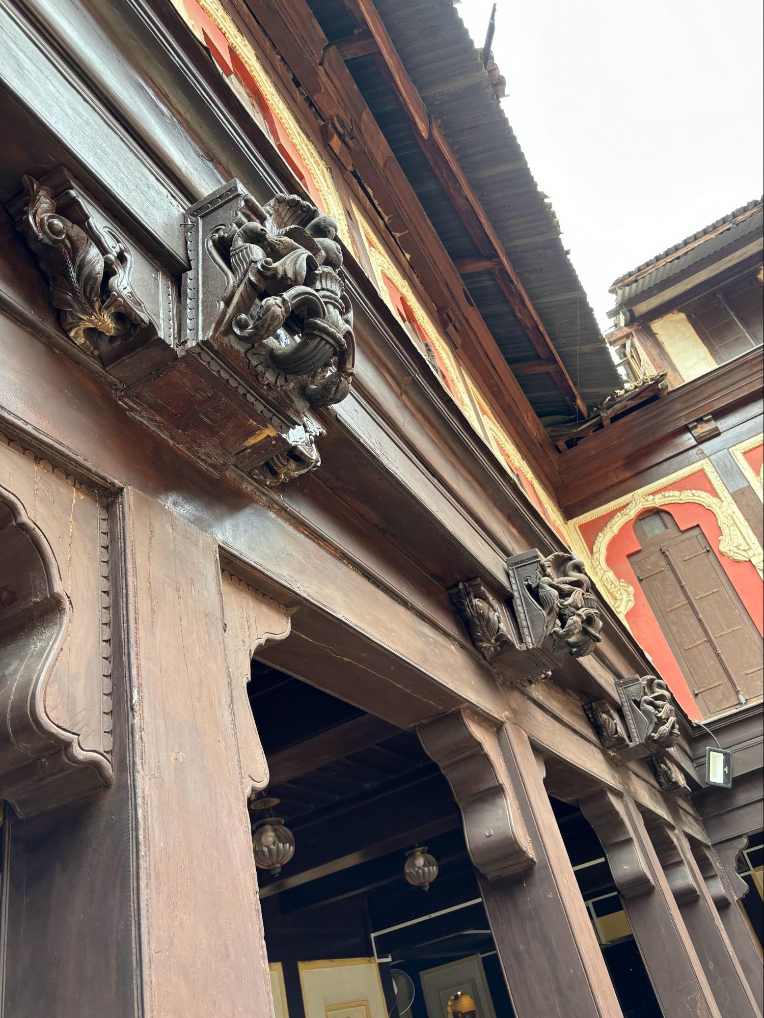 A closeup captures the wooden carvings in detail. (Source: CKA Archives)
