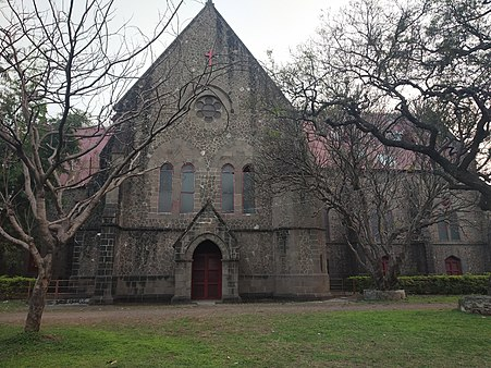 All Saints’ Church in Khadki, Pune that features black stone walls and a red sandstone roof.[2]