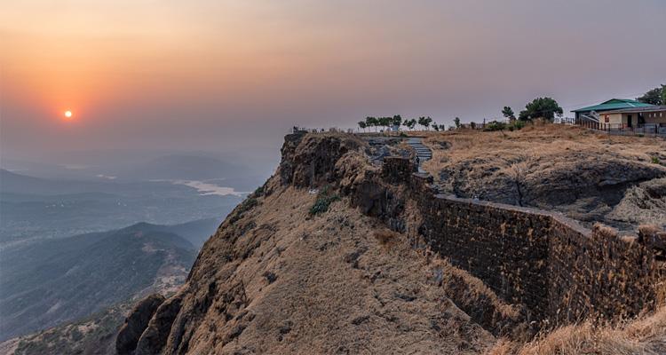 An aerial view of the top of Sinhagad Fort on a cliffside.[86]