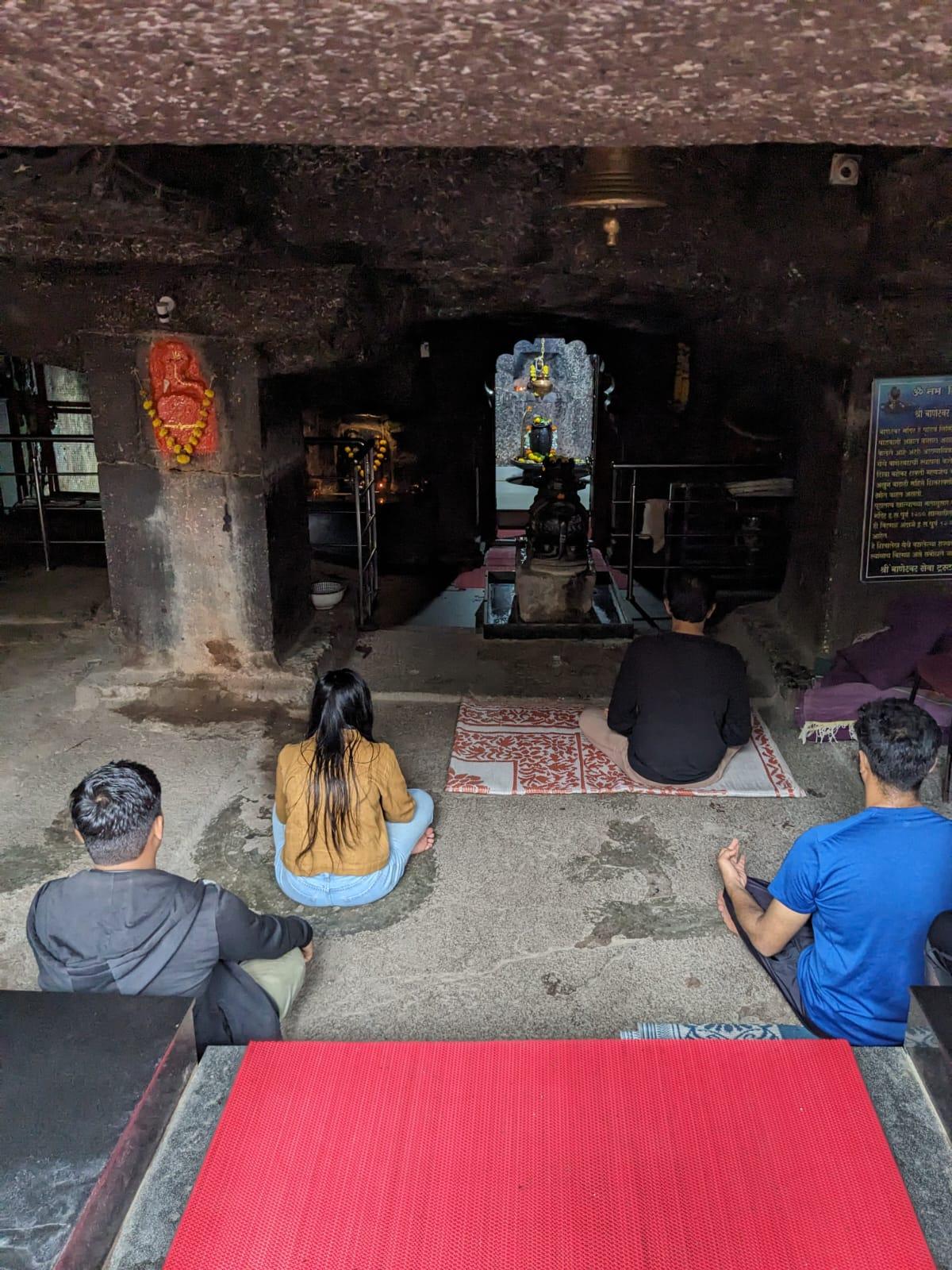 Devotees meditating inside Baneshwar Cave outside the garbhagriha. (Source: CKA Archives)