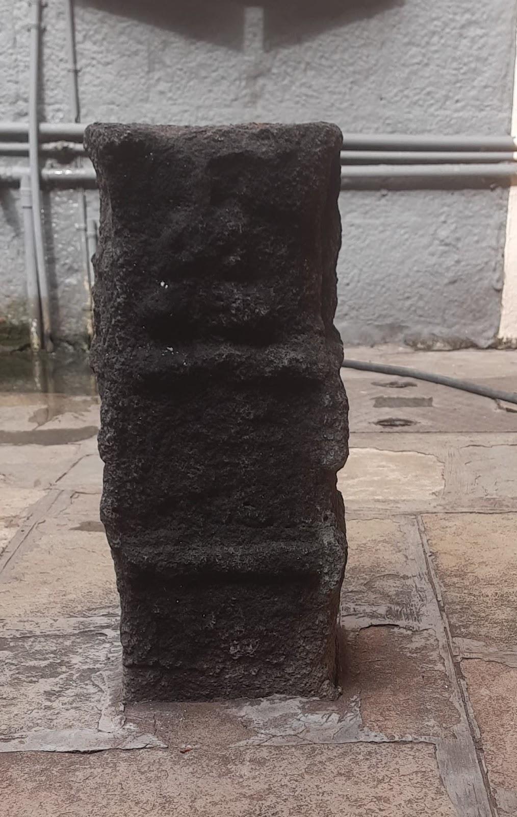 Old stone slabs near the edge of the compound. Set upright and roughly shaped, these stones appear to be old, possibly very old. While their original purpose is unclear, interestingly, such stones were often used in earlier periods for markers or memorials. (Source: CKA Archives)