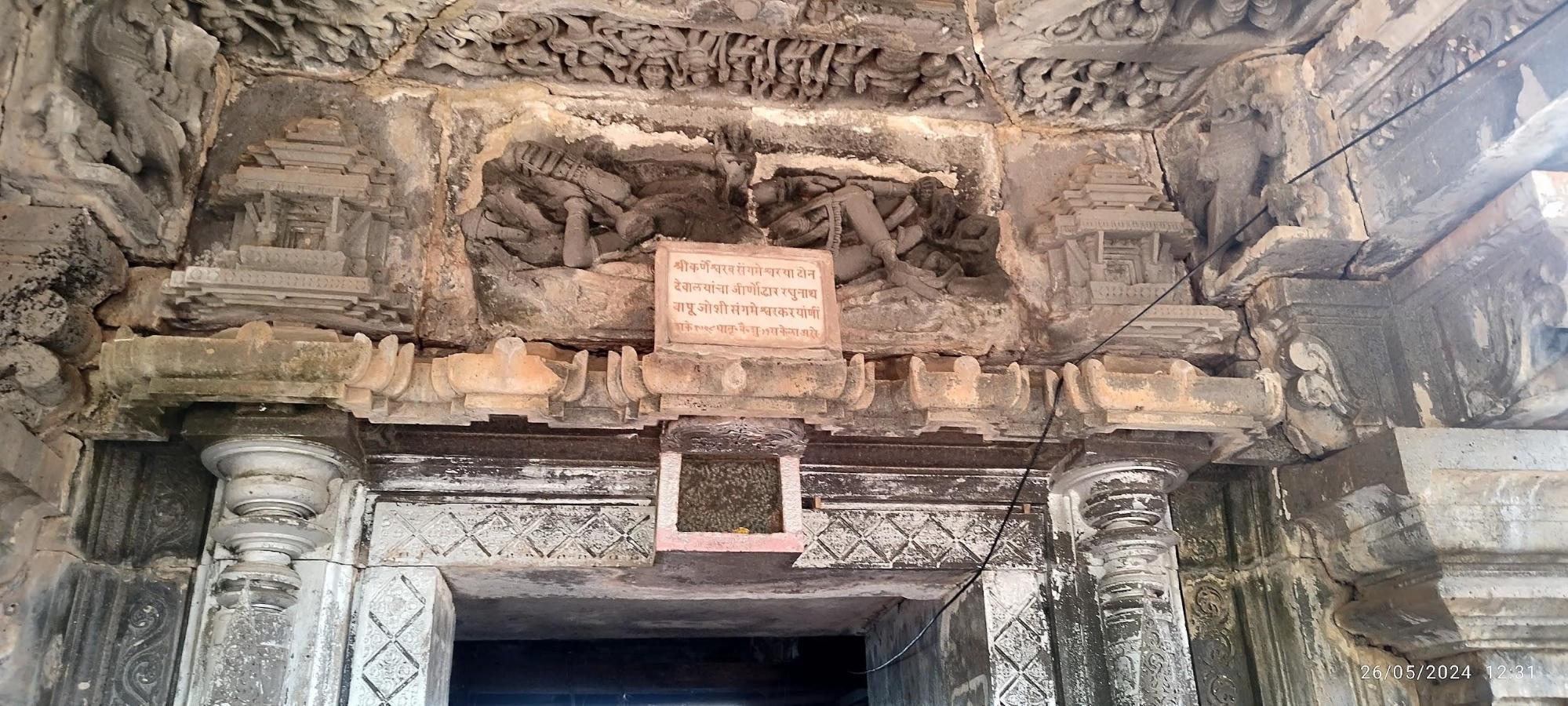 Carved panel above the sabhamandap entrance showing Bhagwan Vishnu in reclining pose beneath the Dashavatars; Balram appears in place of Krishna. (Source: CKA Archives)