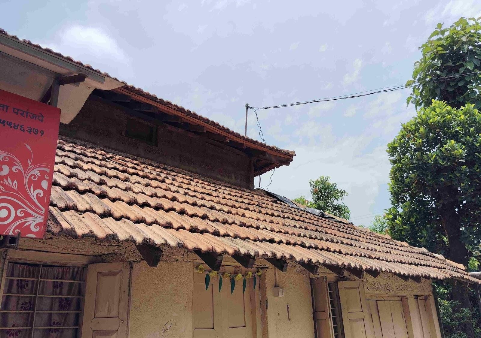 Sloping mud-tiled roof typical of traditional Konkan architecture. (Source: CKA Archives)