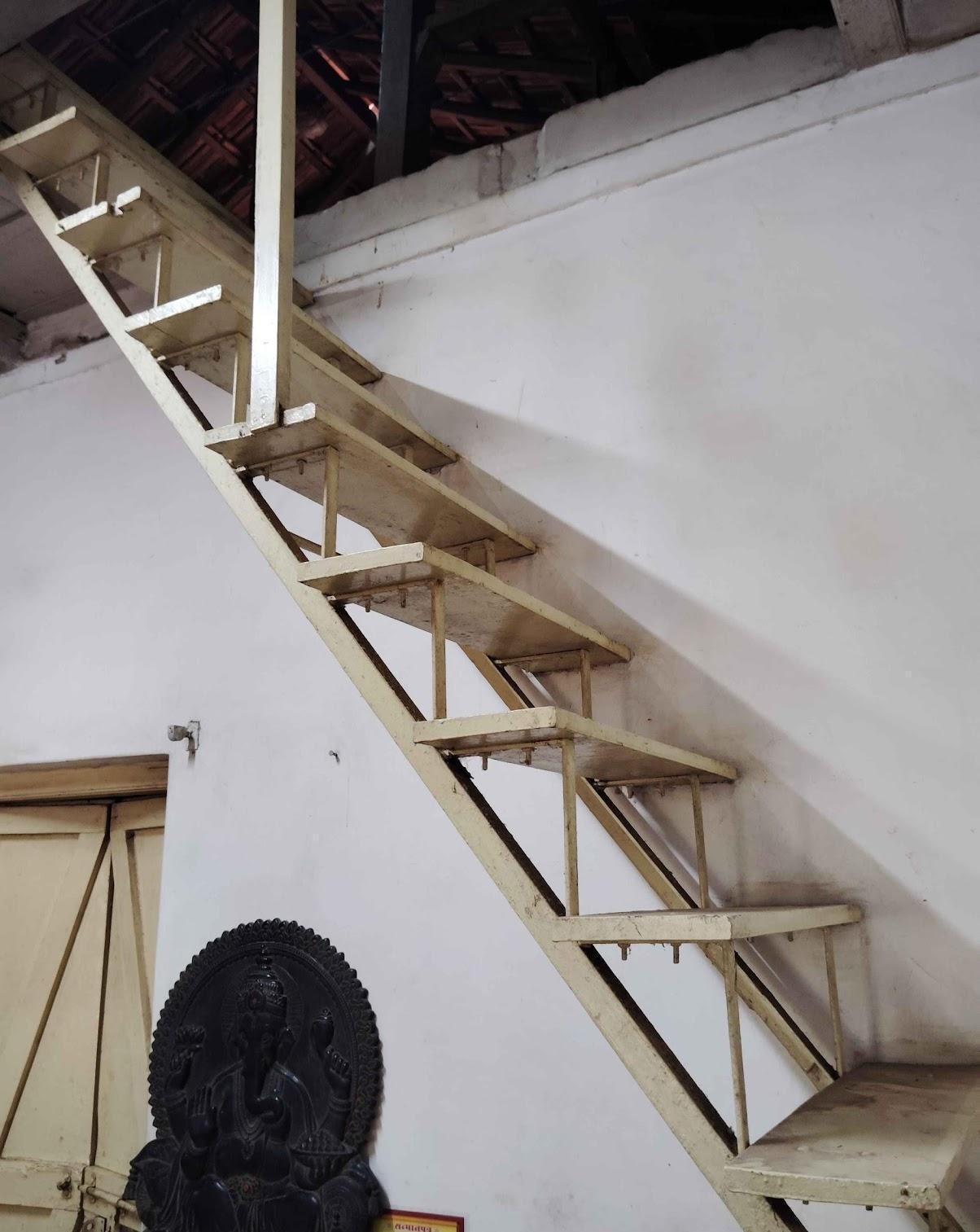 Wooden staircase leading to theattic.(Source: CKA Archives)