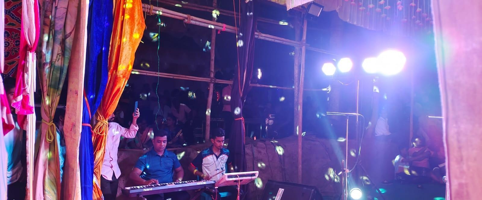 Digital and acoustic instruments—keyboard and active pad— are now part of the Naman soundscape. (Source: CKA Archives)