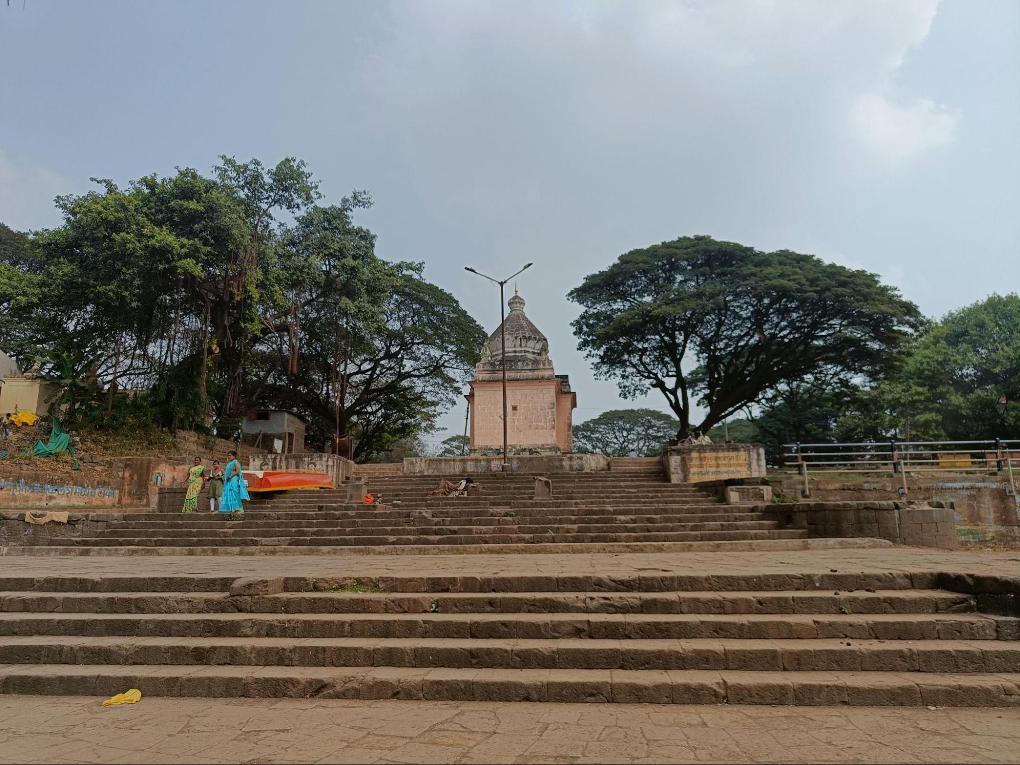 Shri Krishnamai Mandir seen from Sarkari Ghat near the Irwin Bridge in Sangli; the structure often submerges during seasonal floods.(Source: CKA Archives)