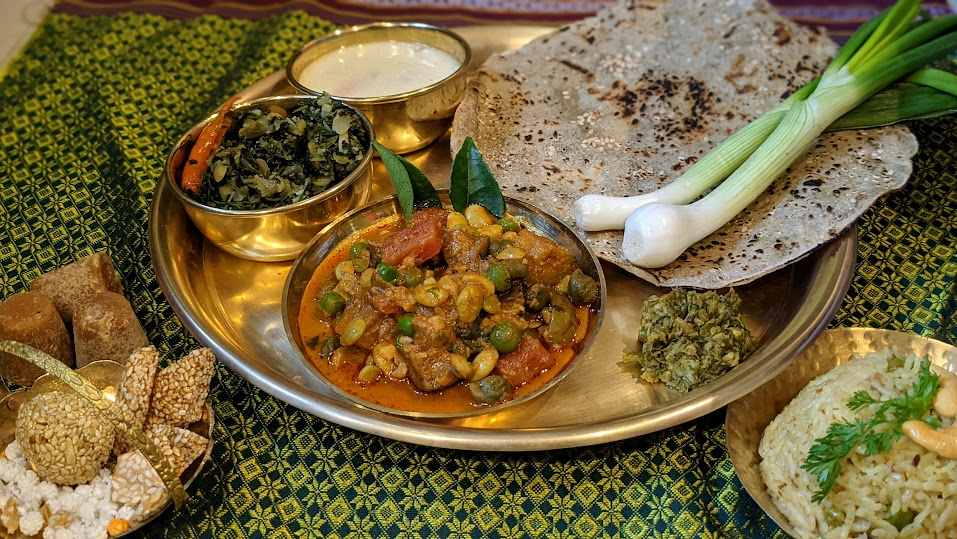 Traditional Makar Sankranti Thali (bhogichi bhaji, bajra bhakri, methi, kharda and til sweets) (Source: CKA Archives)