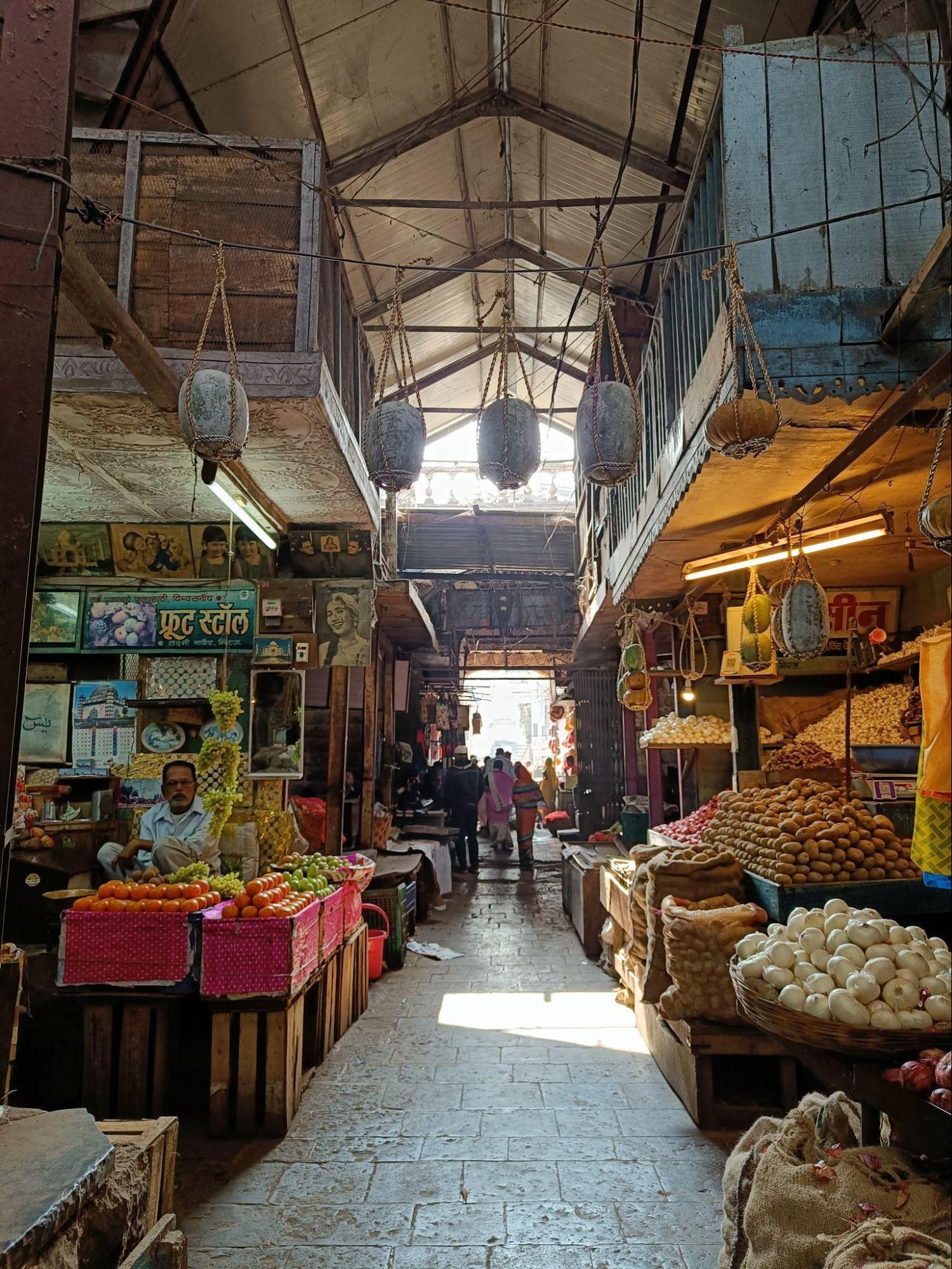 Vendors at Laxmi Market in Miraj continue to sell fresh produce under the historic market’s original roofed structure, built over a century ago. (Source: CKA Archives)