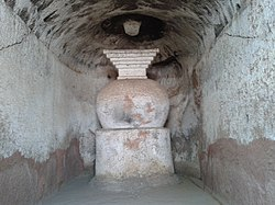 Chaityagriha of one of the early Buddhist caves at Karad, featuring a simple rock-cut structure.