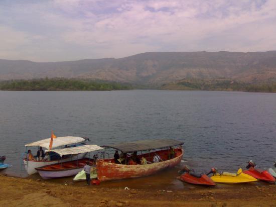 Tapola Lake, part of the Shivsagar Reservoir, with the Sahyadri hills rising beyond its tranquil waters.
