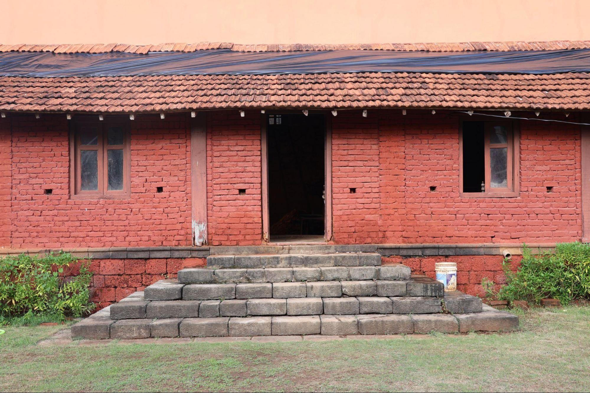 Front view of the clay-tiled roof. The overlapping curved tiles create a textured pattern, typical of roofing systems used in coastal Konkan architecture. (Source: CKA Archives)