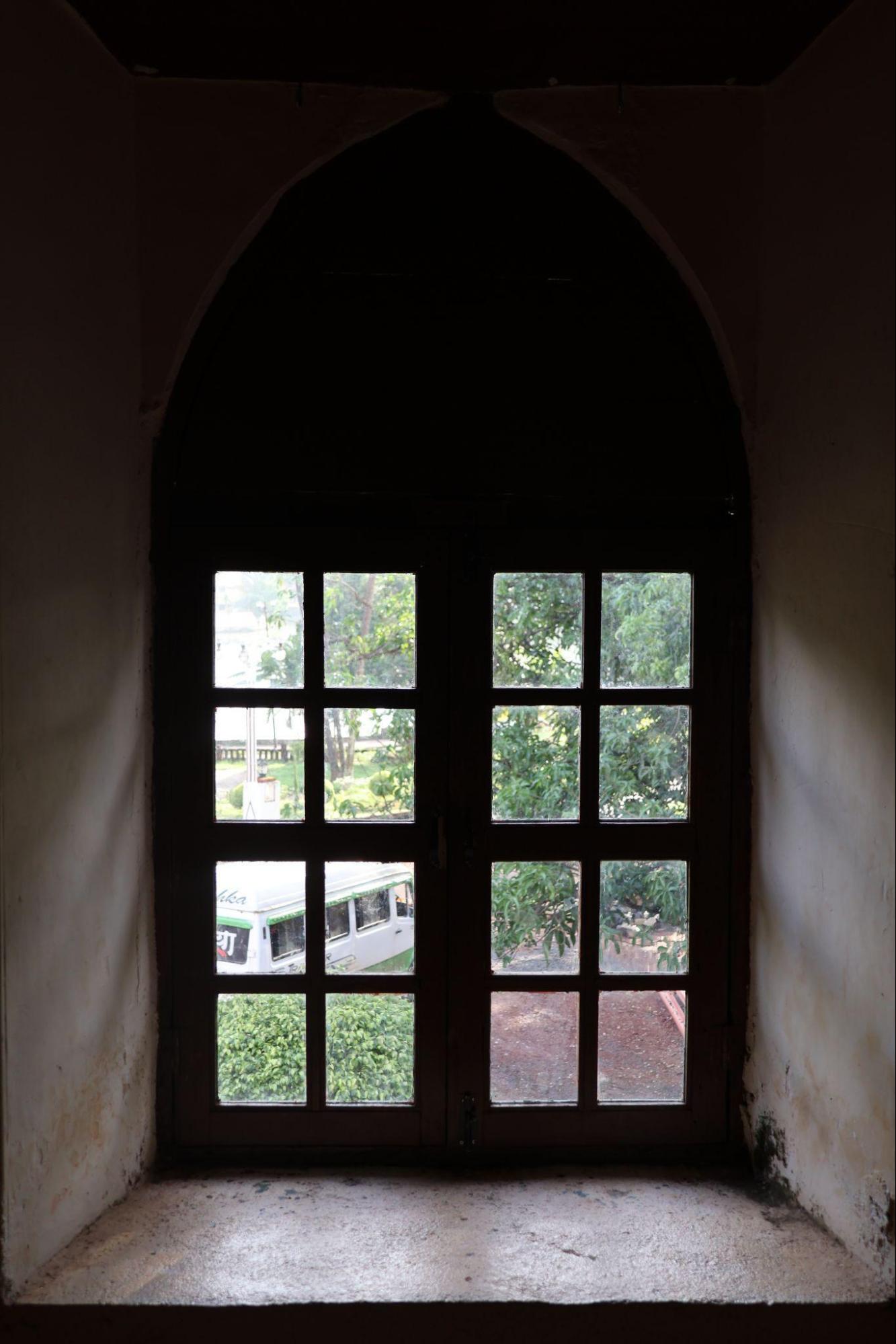 Modern wooden window recessed into the wall. Notice the minimal design and simplistic design. (Source: CKA Archives)