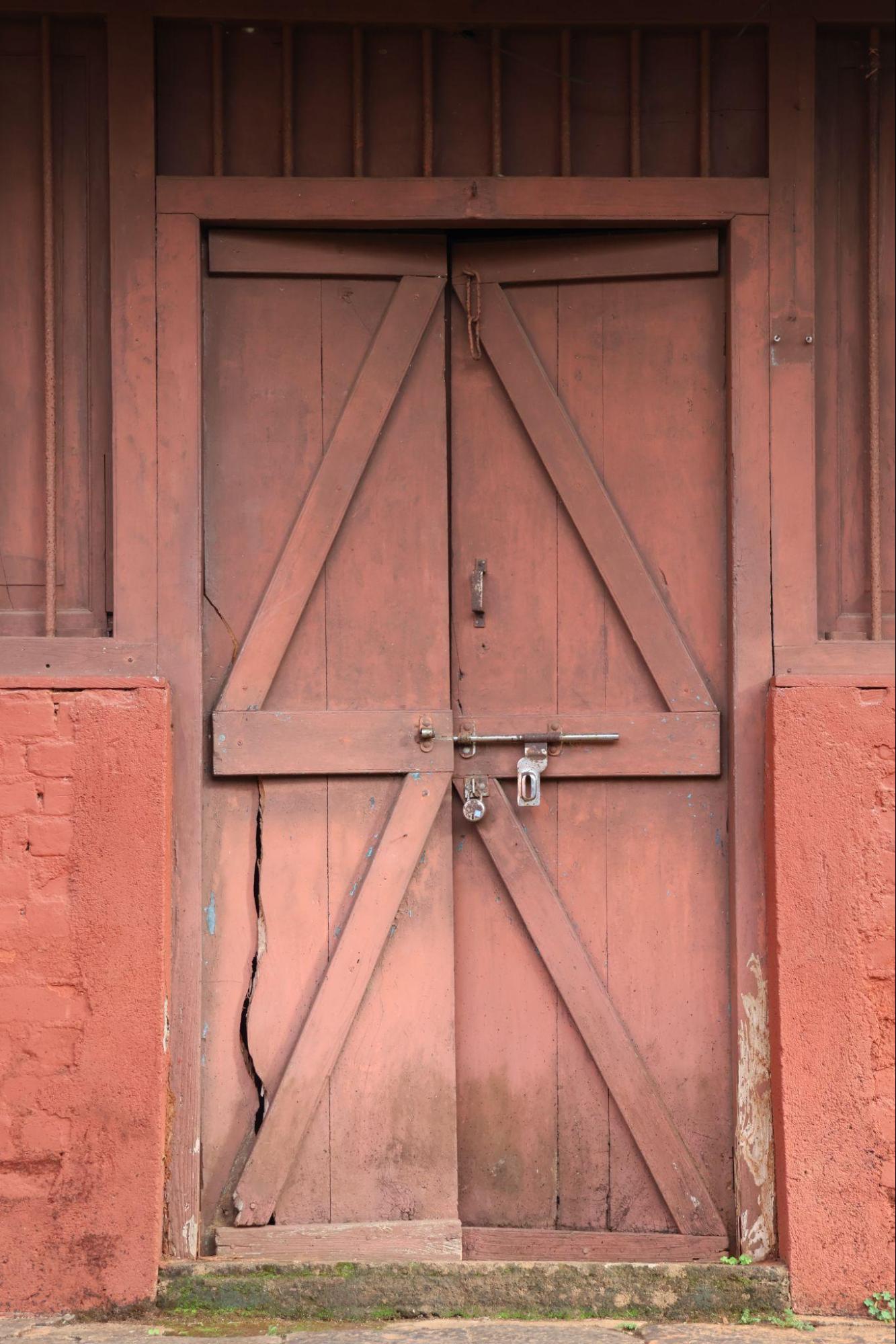 This door shows typical features of domestic design, with a solid wood frame and subtle decorative elements. (Source: CKA Archives)